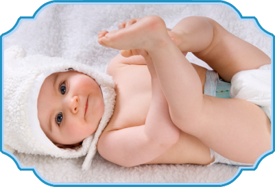Baby wearing a white hooded towel